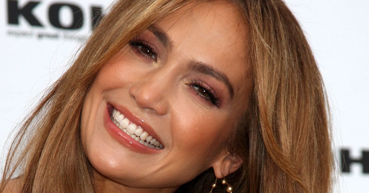 J.Lo's Smile Secrets: Veneers or Natural Glow?